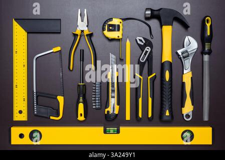 Various hand tools for build and repairing on working table. Stock Photo