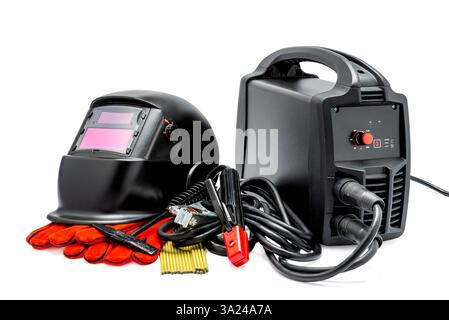 Black inverter welding machine with high-voltage wires and clamps, protective gloves, welding electrodes and welding mask isolated on white background Stock Photo