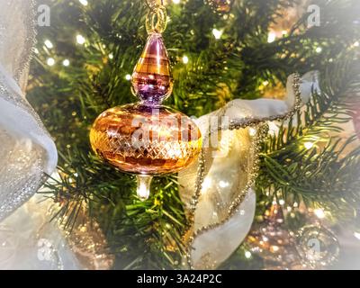 Christmas ornament decoration hanging on a tree. Stock Photo