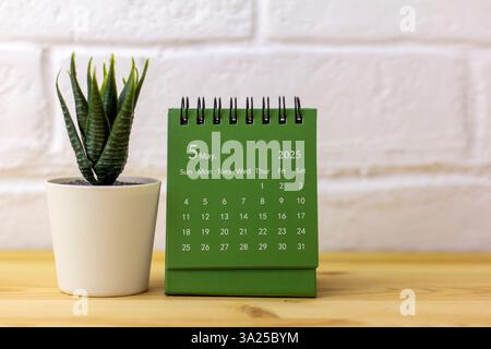 Hello May, desk calendar for planning May 2025 Stock Photo