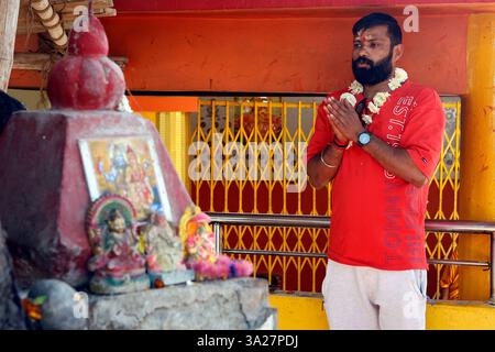 Worshipper praying at the Mahamrityunjaya Temple in Rewa, Madhya ...