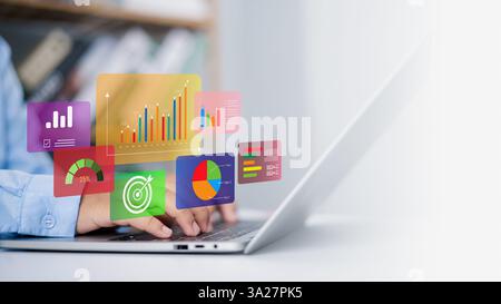 Metrics and KPIs to improve organizational performance, Financial organization strategy, Business people use computers to analyze business and manage Stock Photo