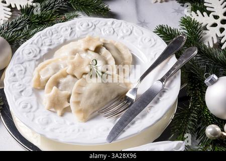 Polish-style dumplings filled with sauerkraut and mushrooms Stock Photo