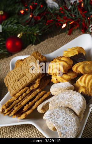 Different types of biscuits with rustic Christmas decorations Stock Photo