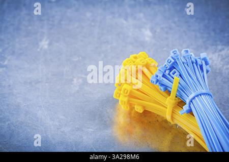 Set of cable ties on metallic background construction concept Stock Photo
