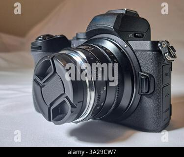 Digital mirrorless camera on the black background Stock Photo - Alamy