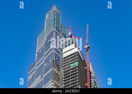 London, England, UK - 22 June 2023: Tower cranes working on a new skyscrapre building of offices and apartments in London Stock Photo