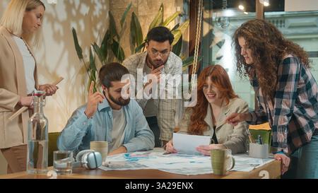 Business team creative freelance group coworkers architects partners students men women girls guys male female study talk discuss corporate startup Stock Photo