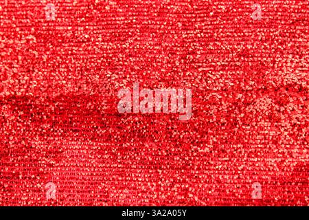 Red textured and glittery fabric Stock Photo