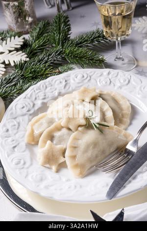 Polish-style dumplings filled with sauerkraut and mushrooms Stock Photo