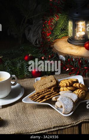Different types of biscuits with rustic Christmas decorations Stock Photo