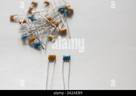 Ceramic capacitors with color markings close-up on a white background Stock Photo