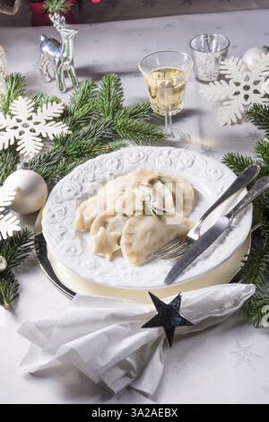 Polish-style dumplings filled with sauerkraut and mushrooms Stock Photo