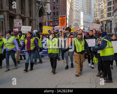 Protest against Donald Trump, Elon Musk, DOGE & Tesla. Chicago, Illinois. March 8, 2025 Stock Photo