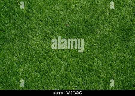 Synthetic artificial green grass used for background or texture Stock Photo