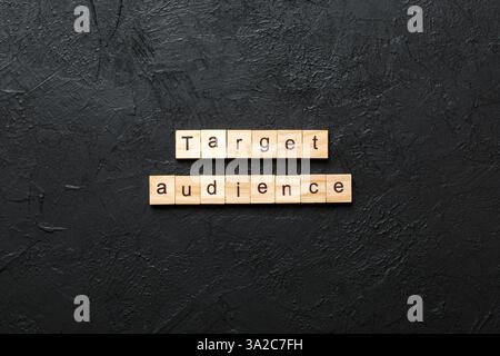 target audience word written on wood block. target audience text on table, concept. Stock Photo