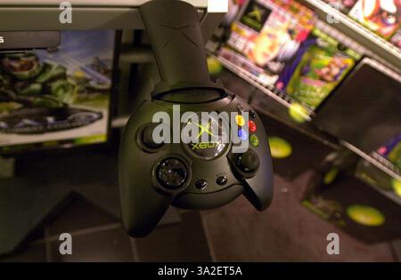 Nov 12, 2001; Pleasanton, CA, USA; A controller for the new X-Box sits dormant as the display for Microsoft's new X-Box video game console sits disabled at the Electronics Boutique in Stoneridge Mall in Pleasanton, Calif. on Monday, November 12, 2001. Within days of each other, Microsoft and Nintendo (Gamecube) debuted their new product. The X-Box shown here was disabled by a ''Parential Block'' according the a store employee. Stock Photo