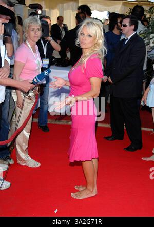 PAMELA ANDERSON .arriving at boat party taking place on the Budweiser Select Yacht for her new film 'Blonde and Blonder' during the 60th International Stock Photo