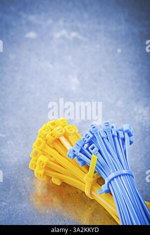Set of self-locking cable ties on metallic background construction concept Stock Photo