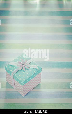 Vintage square gift box on colored background Stock Photo