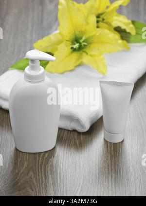 Towel tube flower and bottle Stock Photo