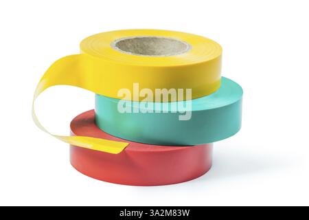 Stack of three colored rolls of insulation tape Stock Photo