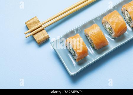 Sushi With Salmon On Blue Rectangular Plate Stock Photo