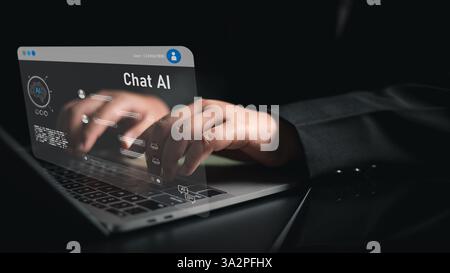 Chat Bot Chat with AI or Artificial Intelligence technology, Human using a laptop computer chatting with an intelligent artificial intelligence asks f Stock Photo