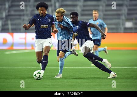Stockholm, Sweden. 13th Mar, 2025. Pafos Bruno and Derrick Luckassen in battle with Djurgården's Oskar Fallenius during the Uefa Conference League match, round of 16, 2nd leg, between Djurgården IF and Pafos at 3Arena in Stockholm, Sweden March 13, 2025.Photo: Oscar Olsson/TT/Code 12046 Credit: TT News Agency/Alamy Live News Stock Photo
