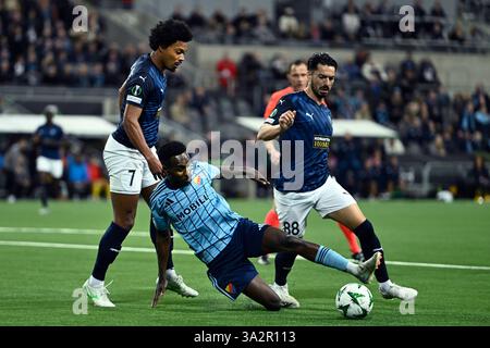 Stockholm, Sweden. 13th Mar, 2025. STOCKHOLM, SWEDEN 20250313Djurgården's Tokmac Nguen against Pafos Bruno and Pêpê during the Uefa Conference League match, round of 16, 2nd leg, between Djurgården IF and Pafos at 3Arena in Stockholm, Sweden March 13, 2025. Photo: Oscar Olsson/TT/Code 12046 Credit: TT News Agency/Alamy Live News Stock Photo