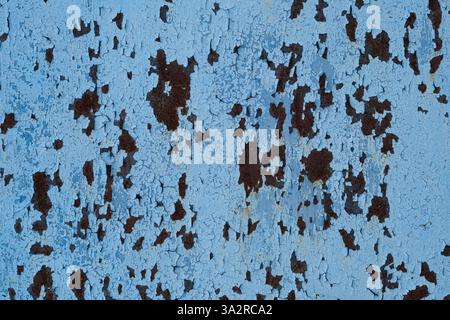 Rusty metal texture with cracked blue paint. Abstract background and texture for design Stock Photo