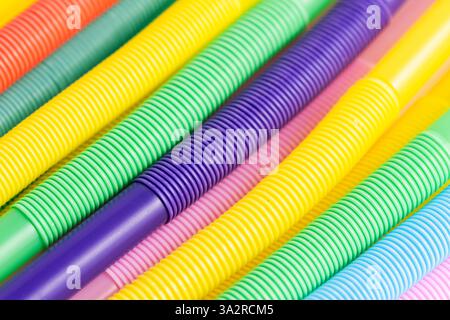 Colorful plastic drinking straws, closeup. Background Stock Photo