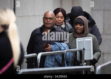 Helen Lumuanganu (second left) and Prosper Kaba (left) the mother and father of Chris Kaba arriving at the Old Bailey, central London, where Metropolitan Police firearms officer Martyn Blake is charged with the murder of Chris in south London on September 6 2022. Mr Kaba died after being shot once in the head through the windscreen of an Audi car in Kirstall Gardens, Streatham. Picture date: Tuesday October 15, 2024. Stock Photo