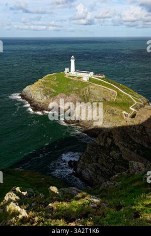 South Stack lighthouse near Holyhead on the island of Anglesey, north Wales, UK. Looking west into the Irish Sea Stock Photo