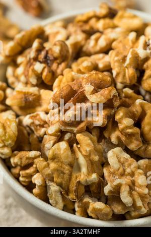 Organic Raw Walnut Halfs in a Bowl Stock Photo