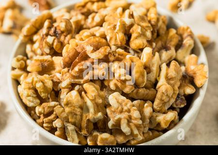 Organic Raw Walnut Halfs in a Bowl Stock Photo
