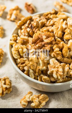 Organic Raw Walnut Halfs in a Bowl Stock Photo