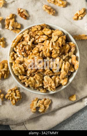 Organic Raw Walnut Halfs in a Bowl Stock Photo