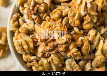Organic Raw Walnut Halfs in a Bowl Stock Photo