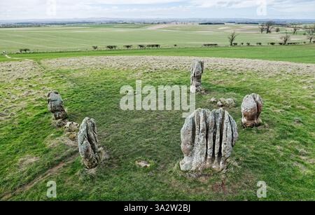Duddo Five Stones prehistoric stone circle in north Northumberland, England. Early Bronze Age. Natural weathering soft sandstone. Looking north west Stock Photo
