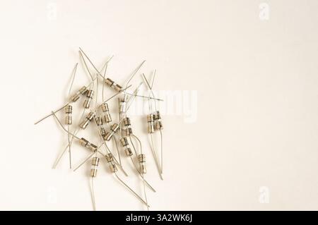Fuse electric fuse miniature on white background. Stock Photo