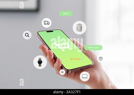 Hand holding smartphone with shopping cart icon, surrounded by floating products and eCommerce UI elements, representing mobile commerce and online re Stock Photo