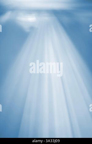 Abstract blue texture with soft light rays. A misty effect creates a sense of lightness and calm. Perfect for backgrounds, design, and creative projec Stock Photo