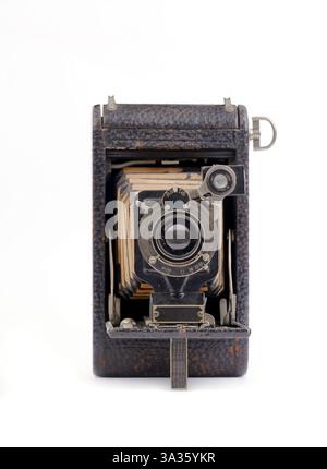 old vintage folding camera on white background Stock Photo