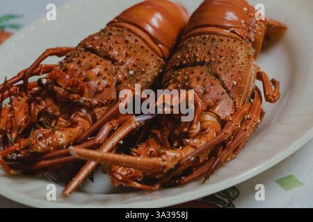 Cooked Lobsters Served on a Plate Stock Photo