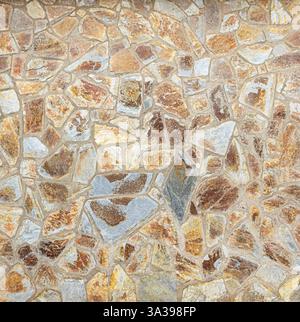 Colorful stone wall forming a rustic style background, ideal for texture Stock Photo