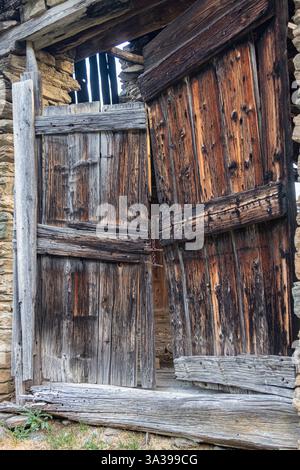 Old wooden gates in Les Combes, Aosta Valley, Western Alps, northwest Italy Stock Photo