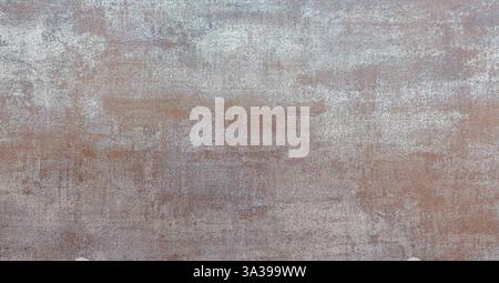 Rusty metal texture with signs of aging and wear, creating an industrial and vintage background Stock Photo
