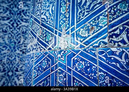 Close up of blue mosaic in ancient palace mausoleum exterior of the Asian famous historical place old city Khiva in Uzbekistan Stock Photo