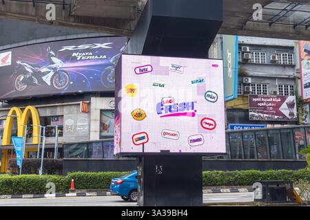 digital billboard displaying an advertisement for "Lagi Fresh," Kuala Lumpur Malaysia Stock Photo